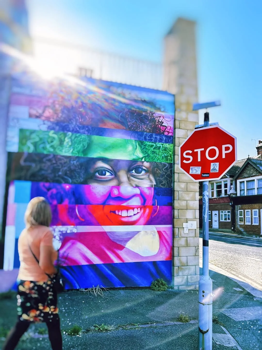 A colourful portrait of local community figure Dawn Fessey near Westcliff station. Mural by Brave Arts, with help from Saida Bee Art.