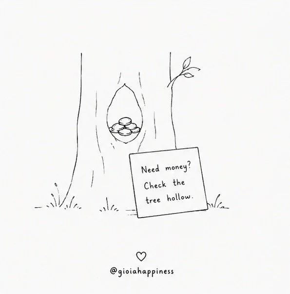 Coins are quietly left inside a tree hollow for someone who may need them, turning an ordinary place into a system of mutual care.