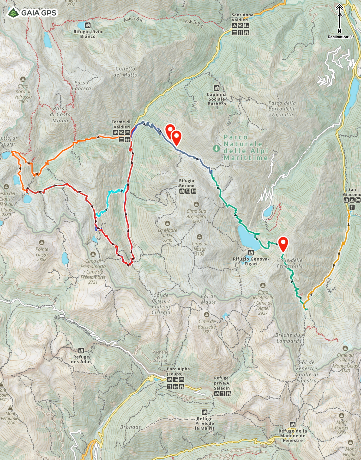 Map of a mountain trail route with multiple trail colors, marked points of interest including refuges, peaks, and parks in a mountainous area.