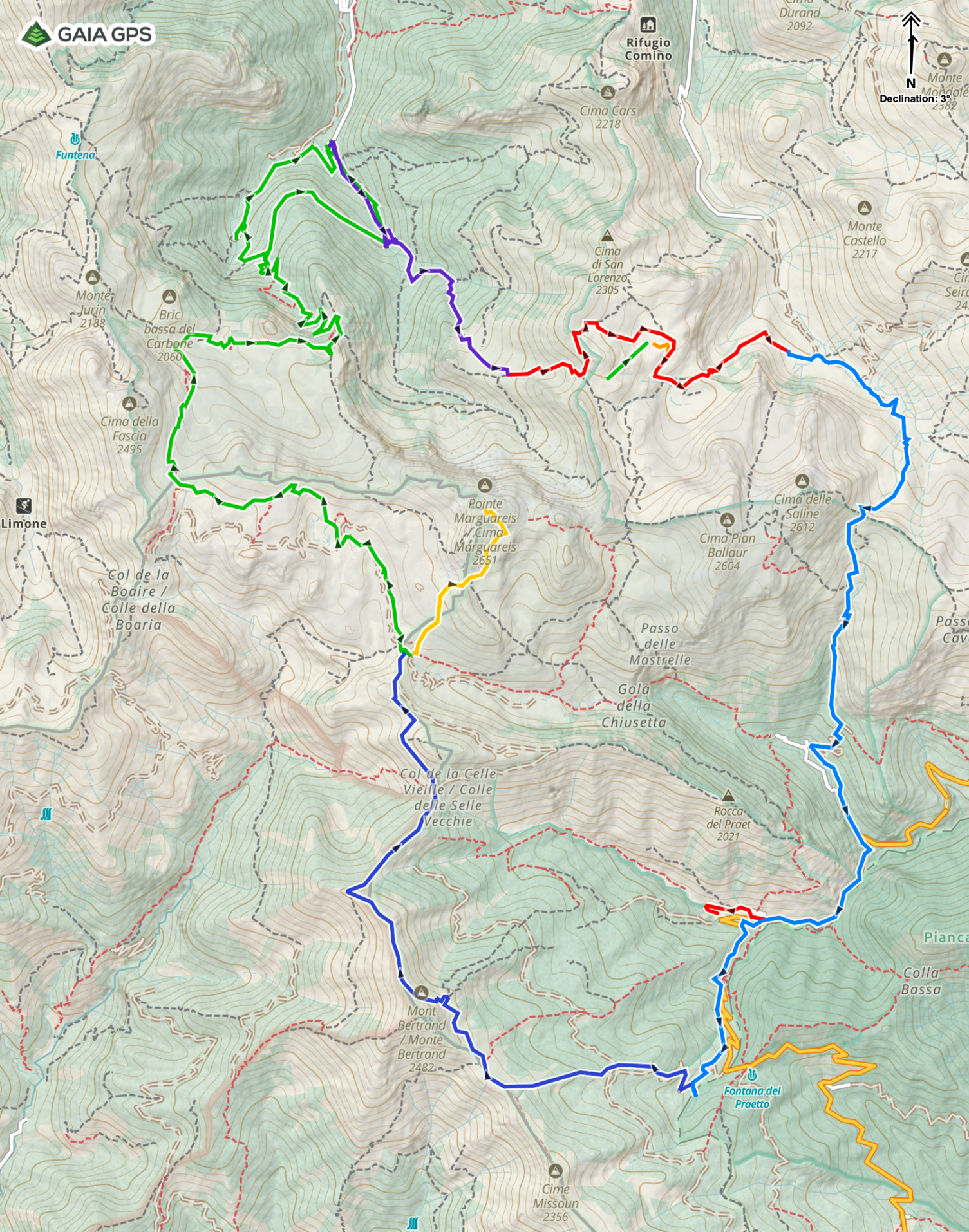 Detailed topographic trail map of a mountainous region. Multiple hiking routes are marked with colors: blue, green, yellow, red, and purple. Landmarks, elevation contours, and natural features like lakes and peaks are labeled.