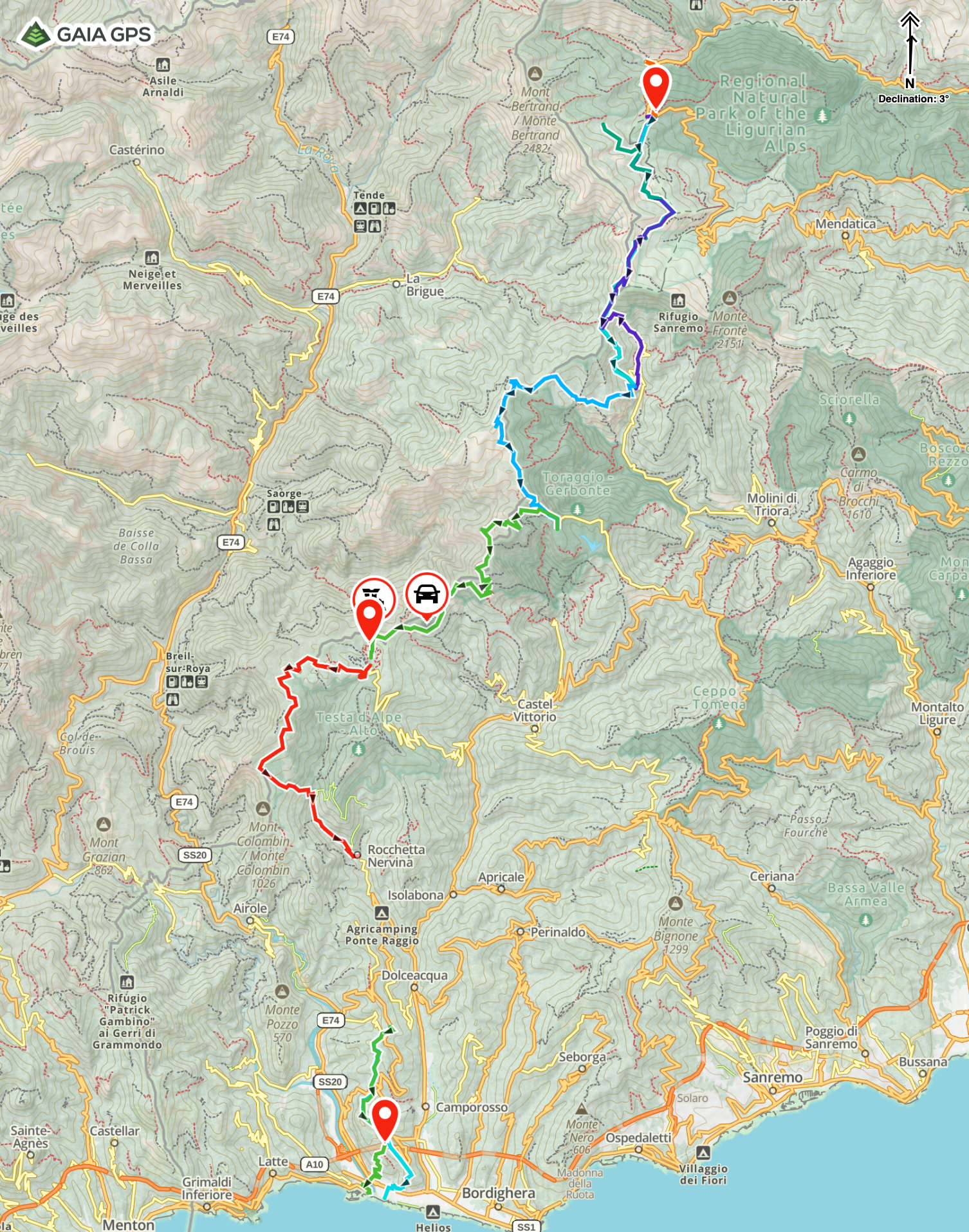 Map showing a hiking and driving route with different color segments, starting from near the coast and ending at a mountain summit in a natural park area.