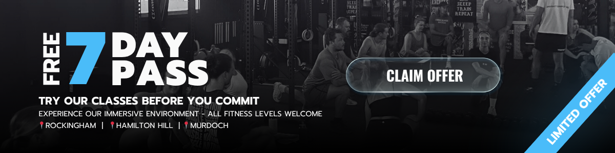 A promotional banner for a free 7-day pass to fitness classes at a gym, featuring a group fitness class with people working out.