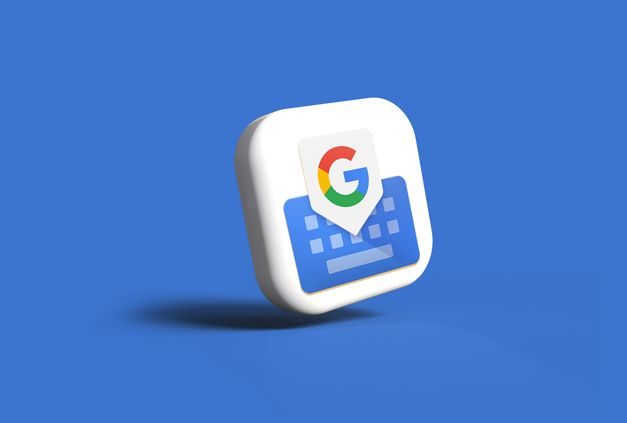 The image is a 3D-rendered icon on a blue background, featuring a white rounded square shape. Within the shape, a blue virtual keyboard is depicted with a multi-colored Google 'G' logo shield-like emblem hovering above the center of the keyboard.