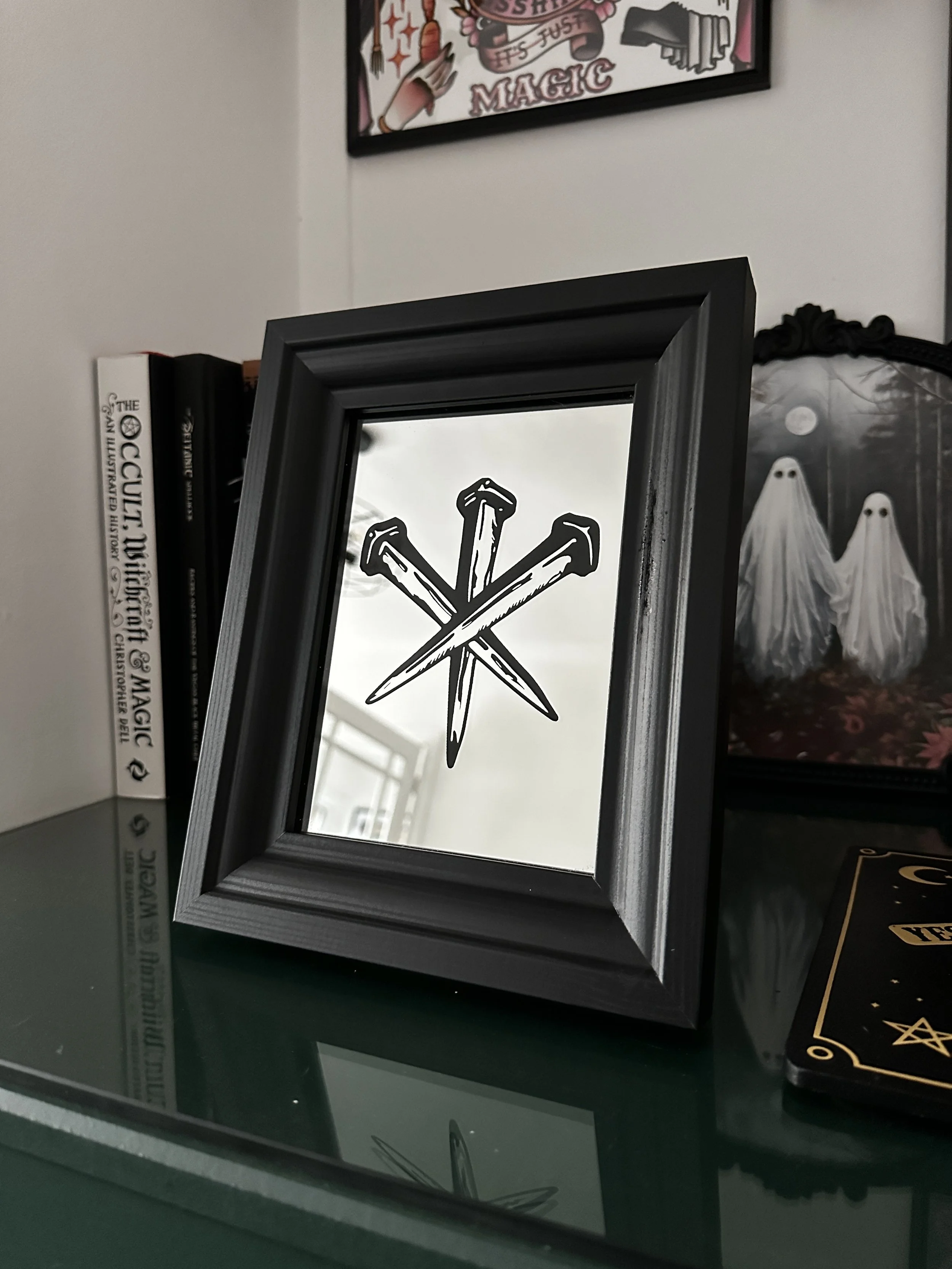 Black Framed Mirror with a Iron Nails