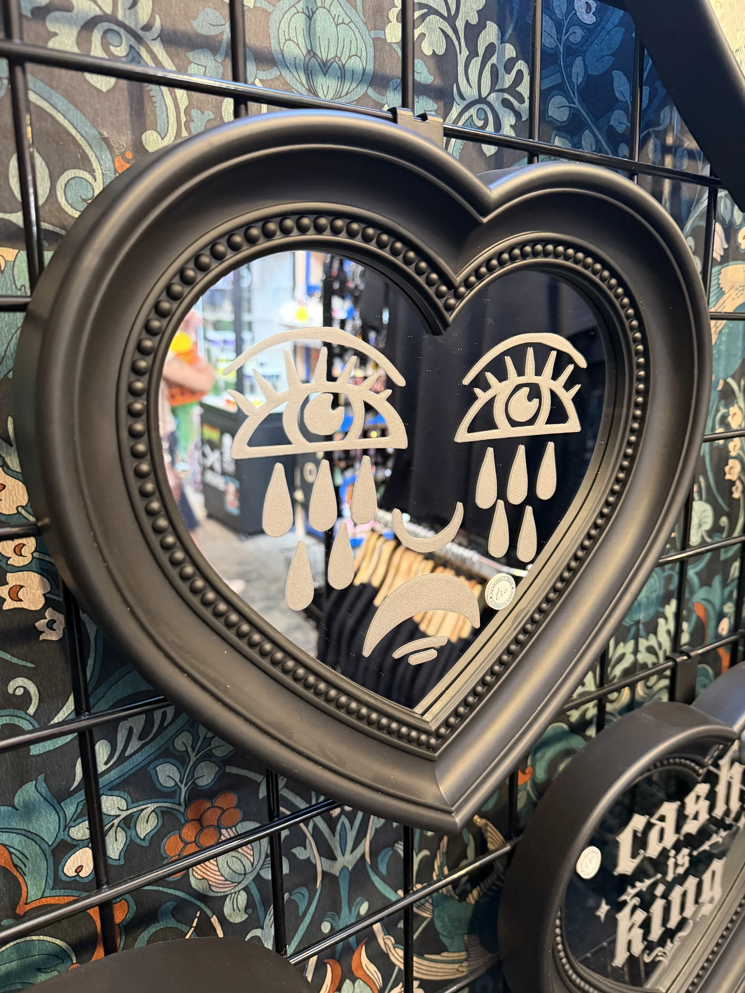 Etched heart mirror with weeping evil eyes and a crescent moon