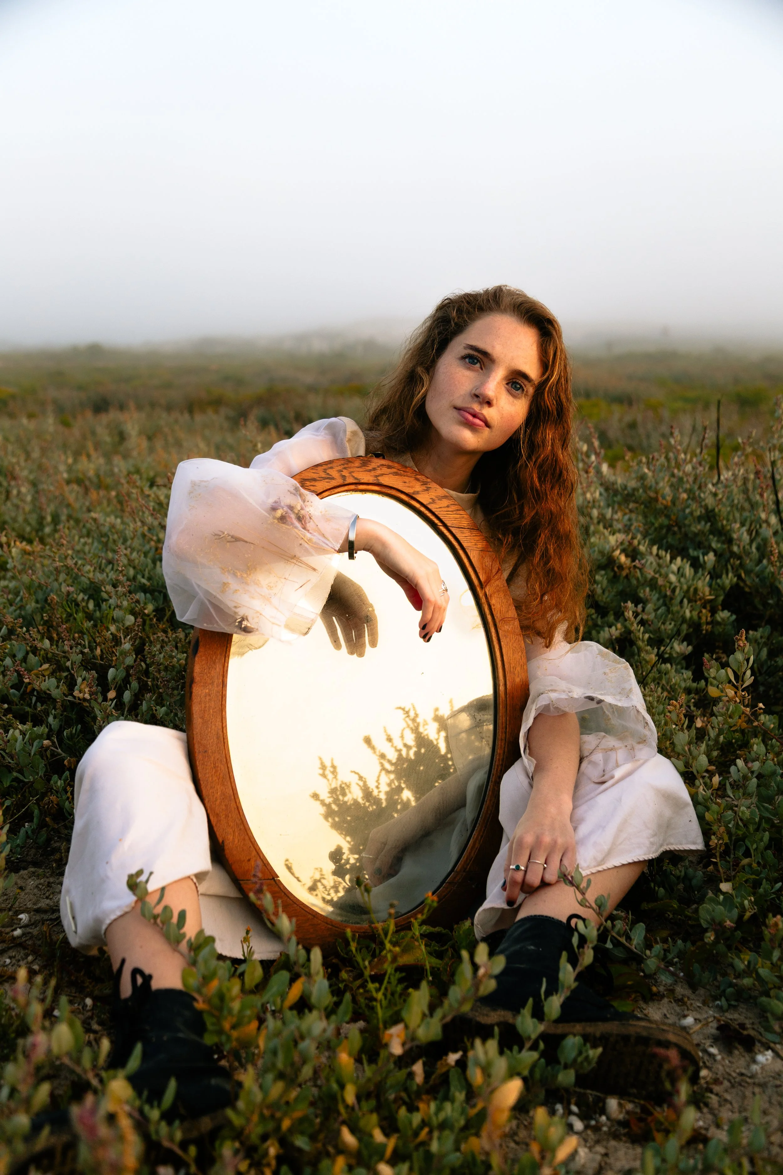 Girl Mirror Sitting.jpg