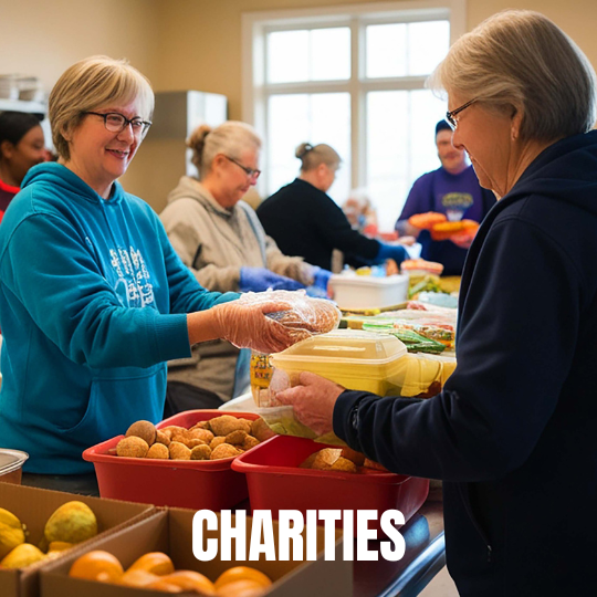 Volunteers joyfully distribute food at a charity event, with diverse people serving meals and fruits. The atmosphere is warm and community-focused.