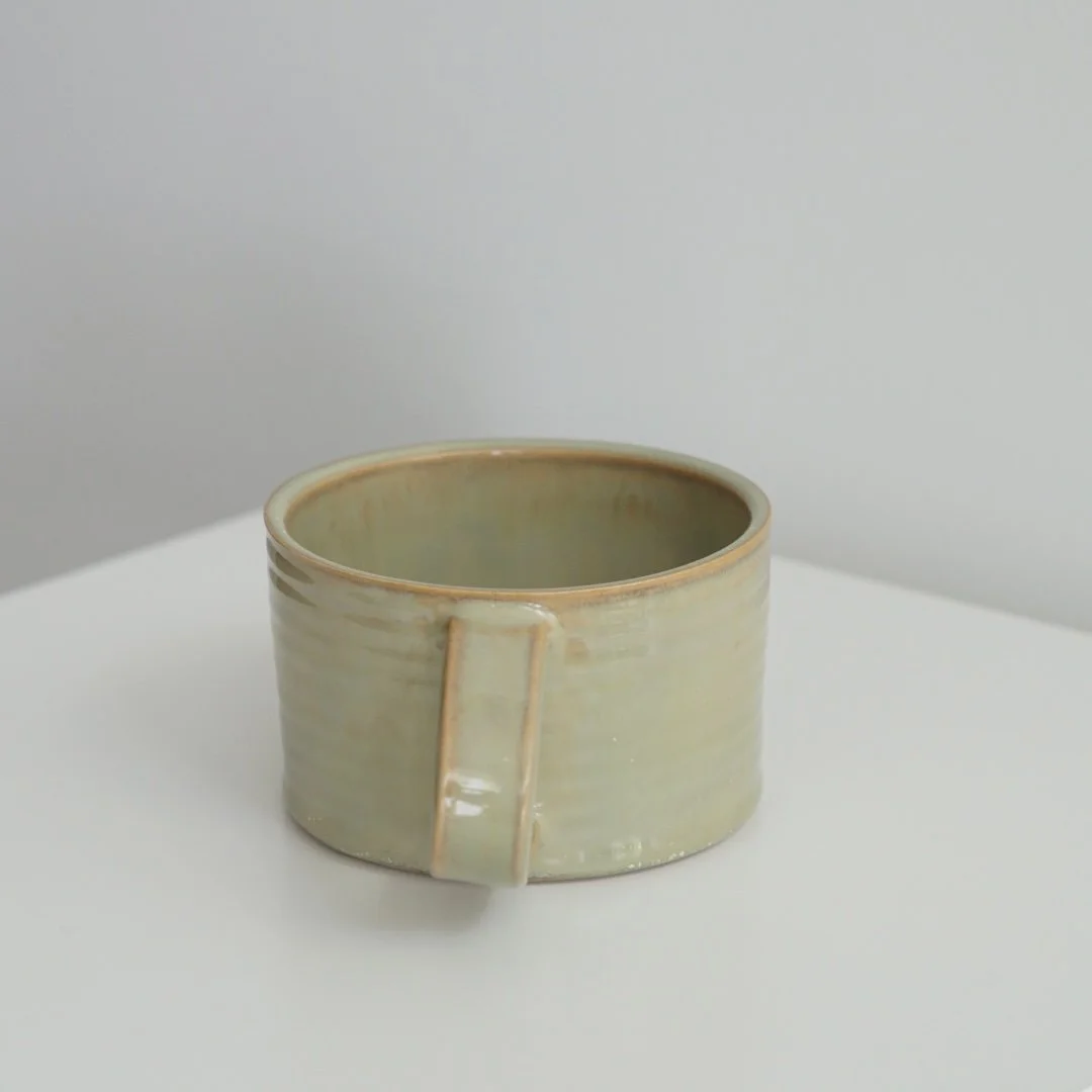 marcel_green_handle_mug.jpeg