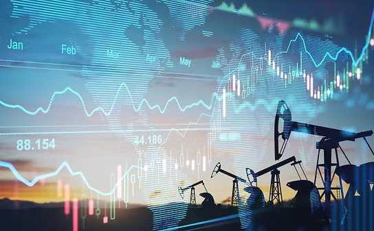 Silhouettes of oil pumps and rigs against a background of financial graphs and stock market data.