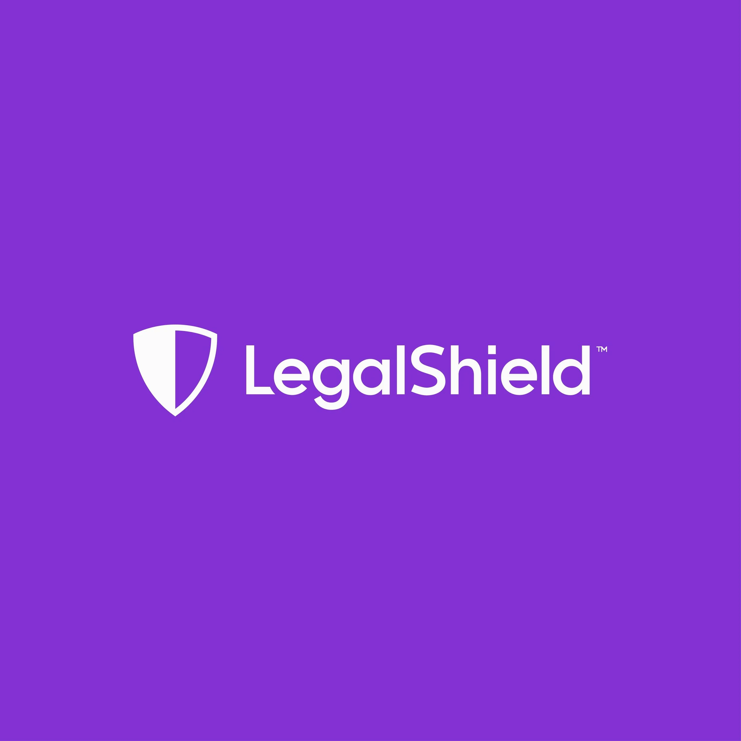 Purple background with white text reading 'LegalShield' accompanied by a shield icon.