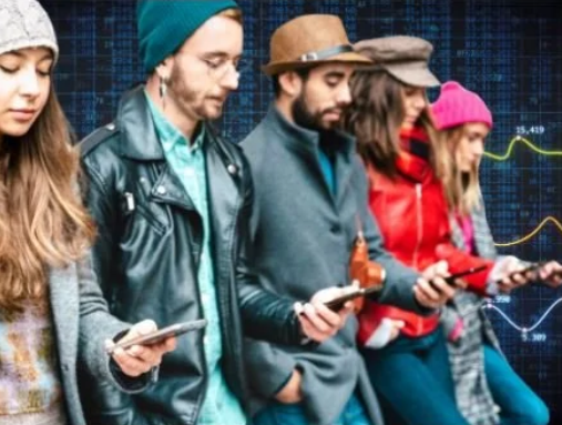 Group of five young adults standing in a row, looking at their smartphones, with a digital financial graph in the background.