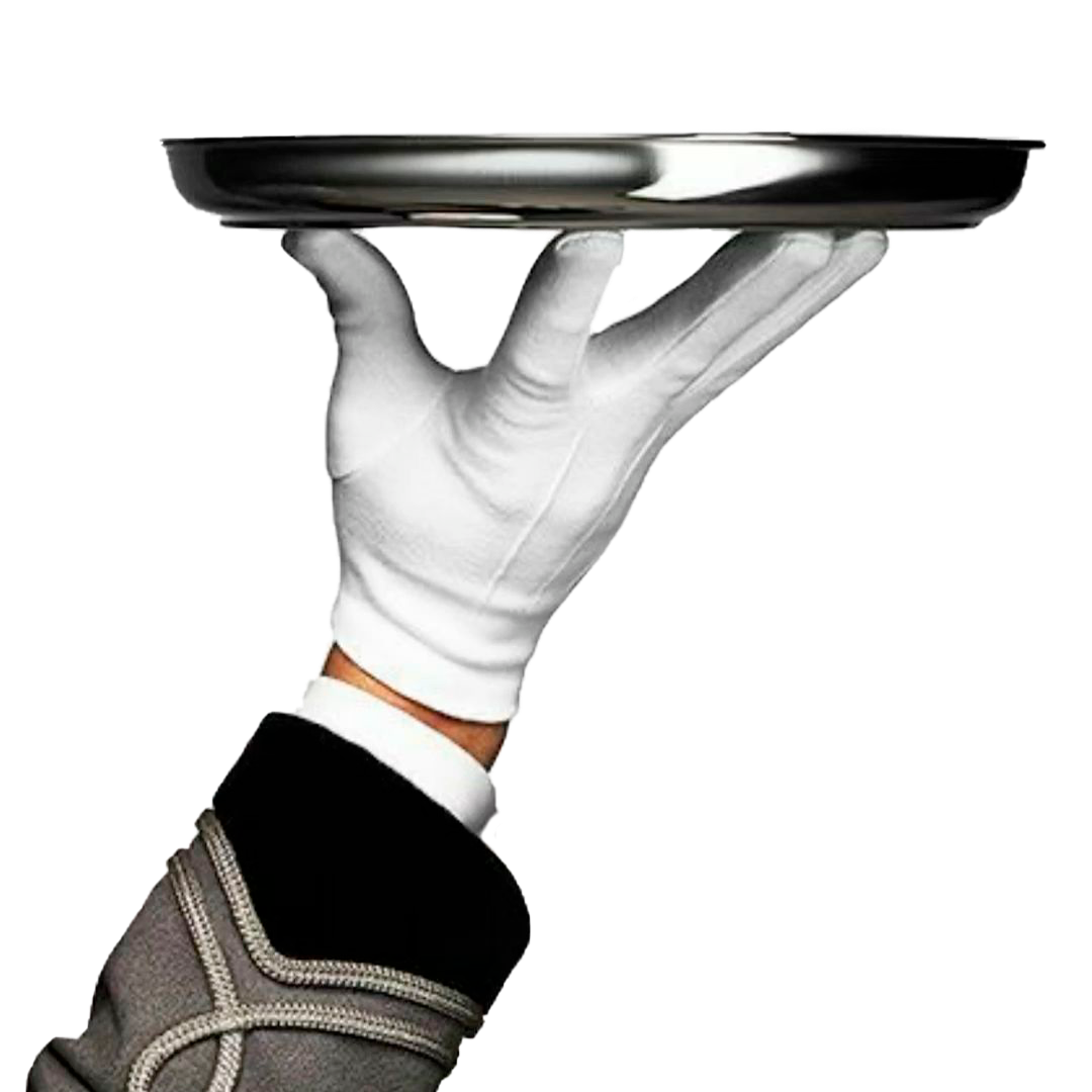 White gloved hand holding a silver tray representing the elevated, white glove creative production service provided by The Aux Co.