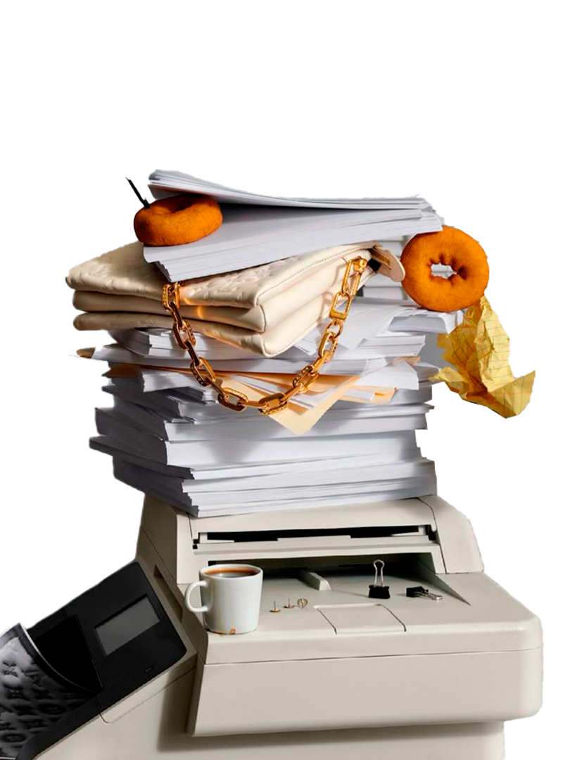 Overloaded office scanner with paperwork, coffee cups, and clutter symbolizing agency production chaos that The Aux Co helps resolve.