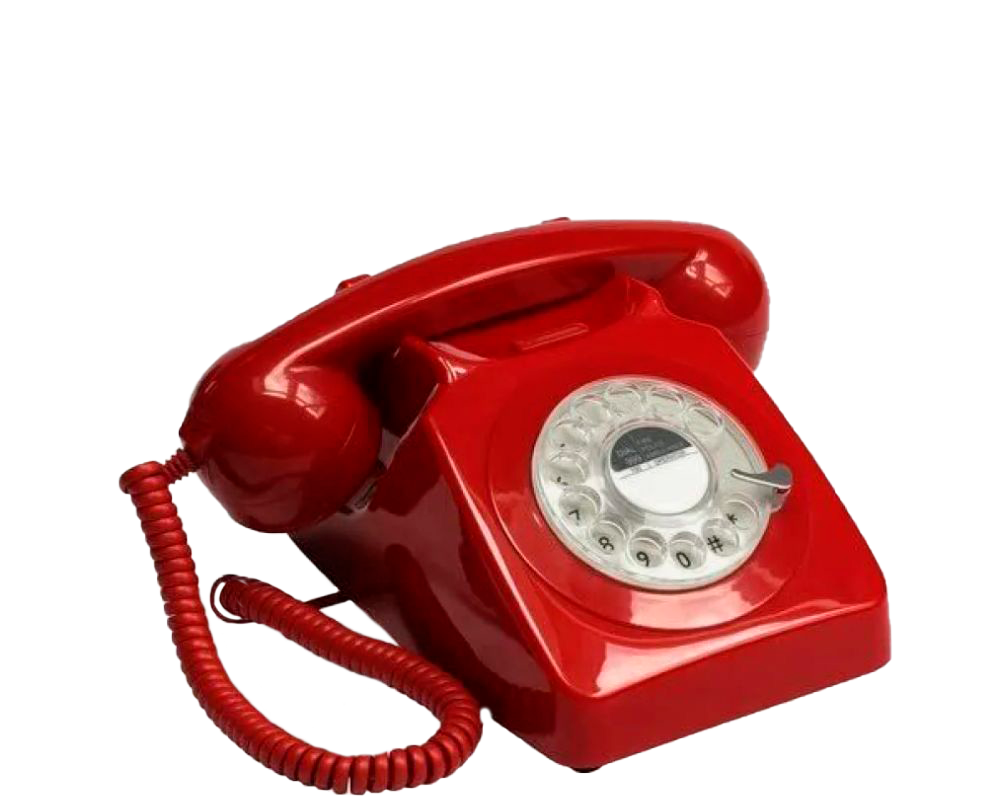 Close-up of a vintage red rotary dial telephone against a black background.