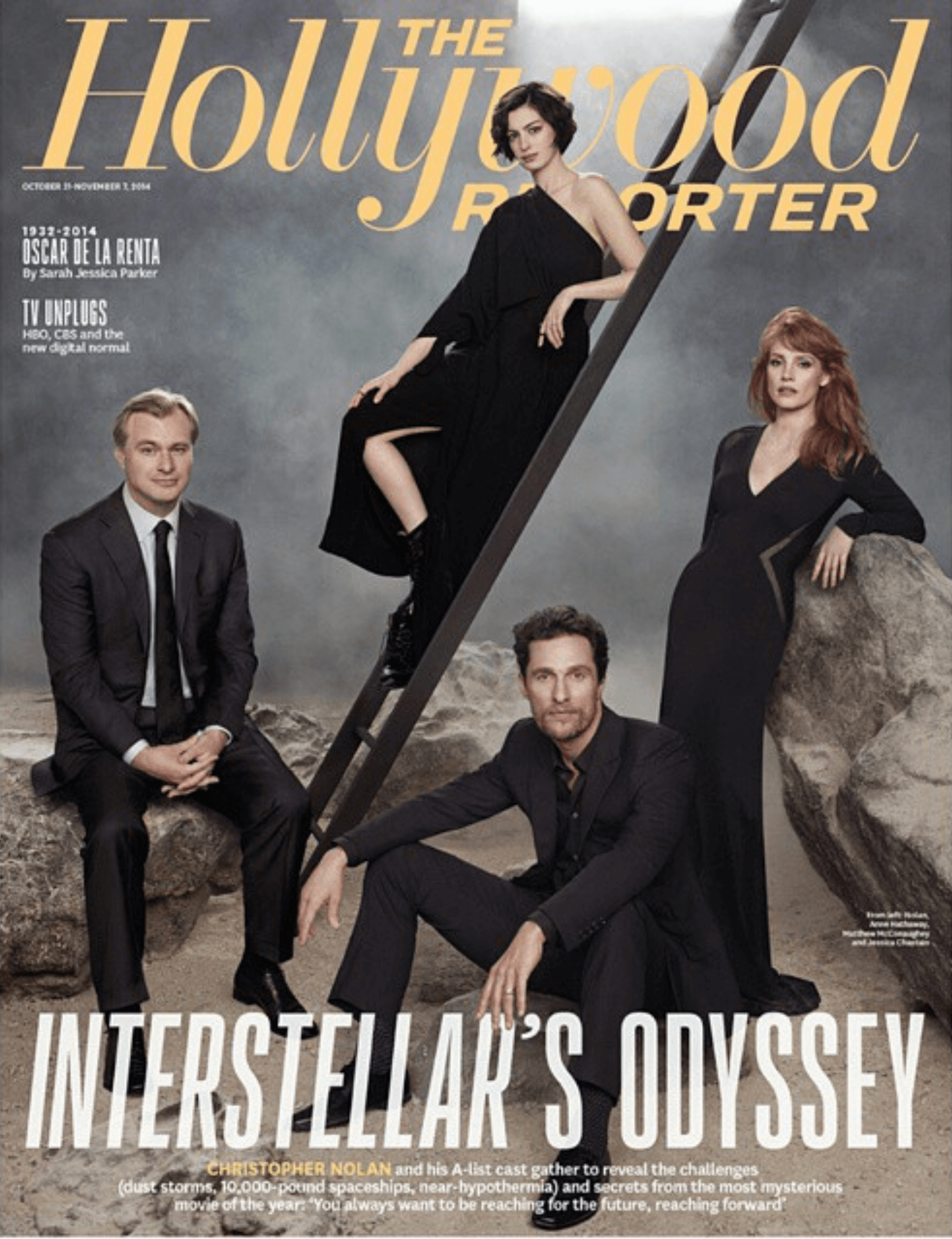 Cover of The Hollywood Reporter magazine featuring the cast of Interstellar in a desert setting with rocks and a cloudy sky, including four actors posing around a ladder.