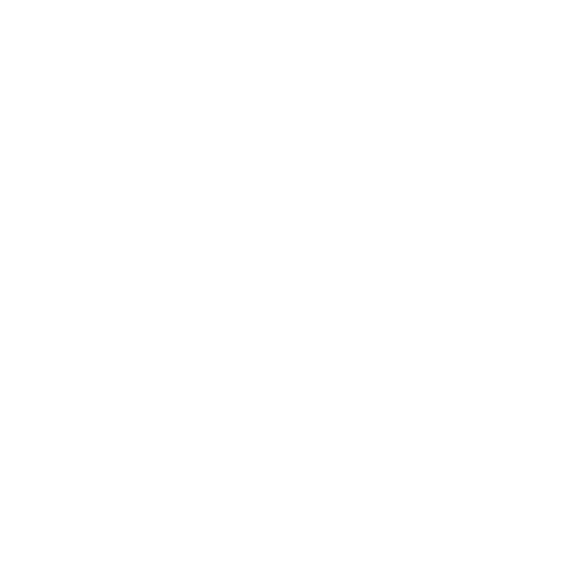 A black and white stylized circular design resembling a sunflower or a wheel with a spiral pattern in the center.