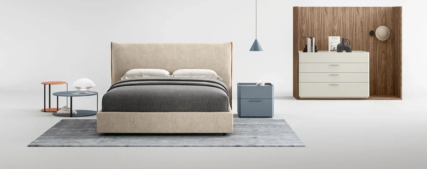 Cinquepuntozero Bilbao Italian beige fabric bed featuring rich wood and eco-leather cord accents, custom-configured by ArkNova Interiors for modern master bedrooms in Paphos and across Cyprus.