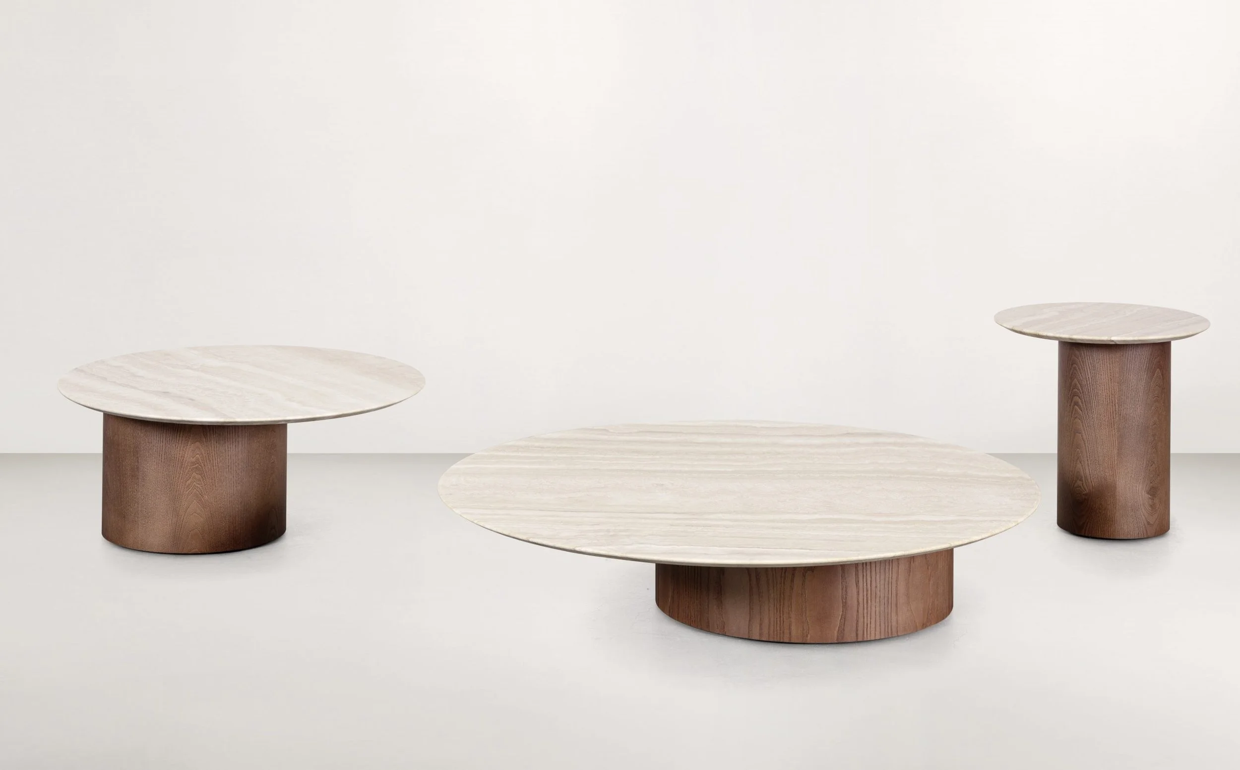 Frag Myon 120 Italian round wood coffee and side tables in light oak tones, contemporary design at ArkNova Interiors Paphos showroom in Cyprus