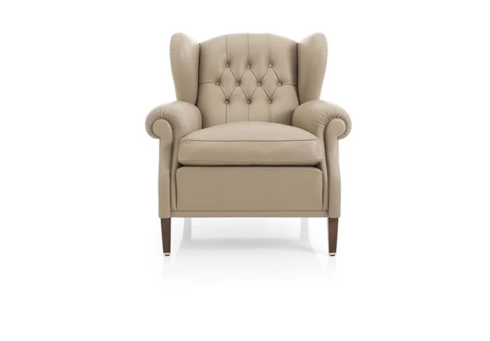 Albani Divani Elisabeth Italian beige leather tufted wingback armchair at ArkNova Interiors Paphos showroom in Cyprus