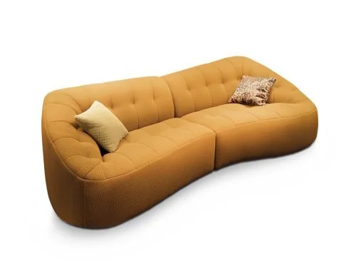 Miki Ferrari Armonia Italian mustard yellow curved tufted sectional sofa, modern design at ArkNova Interiors Paphos showroom in Cyprus