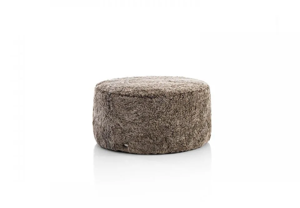 Italian Albani Divani Rondò round boucle fabric pouf at ArkNova Interiors Paphos showroom in Cyprus