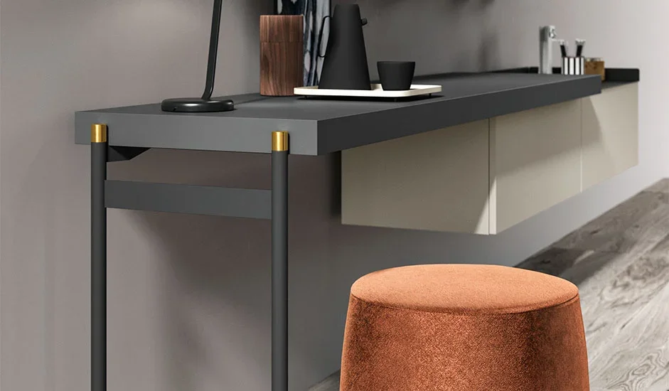 Italian Cinquepuntozero C Leg modern console desk with black top and orange stool at ArkNova Interiors Paphos showroom in Cyprus