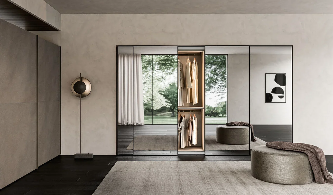 Italian Cinquepuntozero Specchio Door mirror sliding wardrobe doors with reflective surface at ArkNova Interiors Paphos showroom in Cyprus