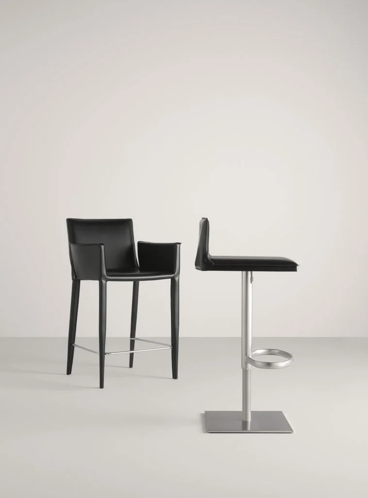 Frag Latina CP Italian black leather bar stools with arms and footrest at ArkNova Interiors Paphos showroom in Cyprus