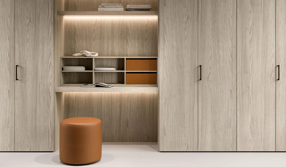 Cinquepuntozero Desk With Raster Italian built-in wood desk with LED lighting and orange drawers at ArkNova Interiors Paphos showroom in Cyprus