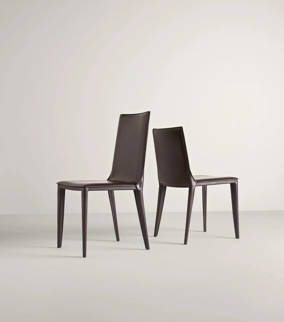 Frag Latina Italian dark brown leather dining chairs with sleek modern design at ArkNova Interiors Paphos showroom in Cyprus