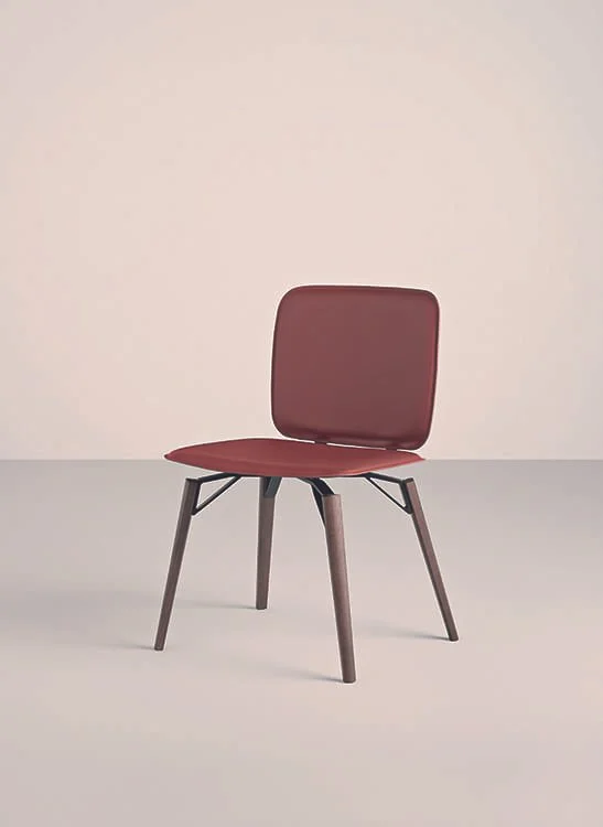 Frag Iki W Italian maroon leather dining chair with black wooden legs at ArkNova Interiors Paphos showroom in Cyprus