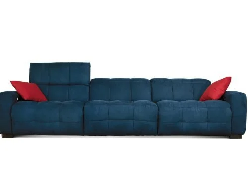Miki Ferrari Karma Italian blue tufted three-seater sofa with red pillows, modern design at ArkNova Interiors Paphos showroom in Cyprus