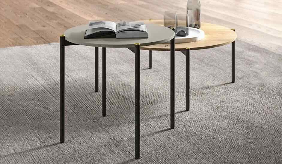 Cinquepuntozero nesting round coffee tables in gray and natural wood with black legs, modern Italian design at ArkNova Interiors Paphos showroom in Cyprus