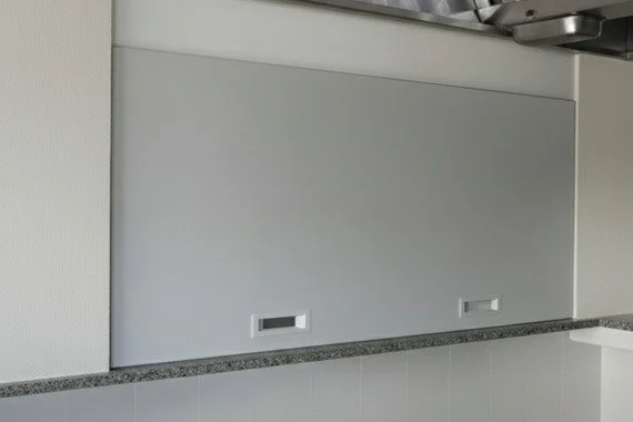 Novoferm Saliscendi Italian gray horizontal sliding service hatch with recessed handles at ArkNova Interiors Paphos Cyprus