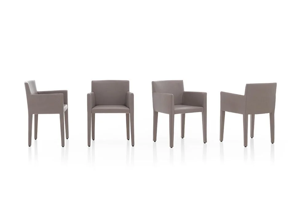 Albani Divani Golf Italian gray fabric dining armchair with clean lines at ArkNova Interiors Paphos showroom in Cyprus