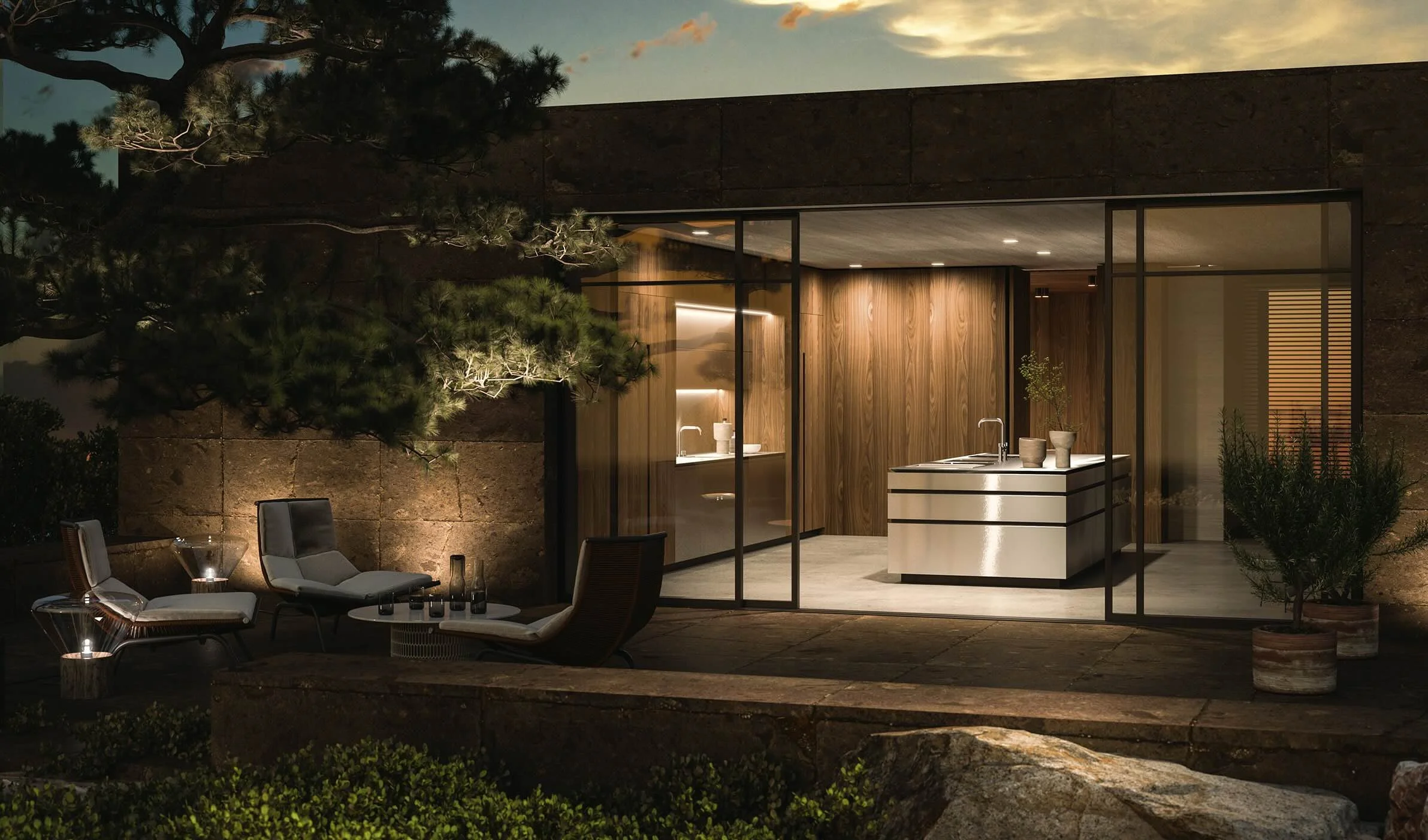 Antares Cucine Mood Italian kitchen exterior night view with illuminated island and outdoor seating, available at ArkNova Interiors Cyprus