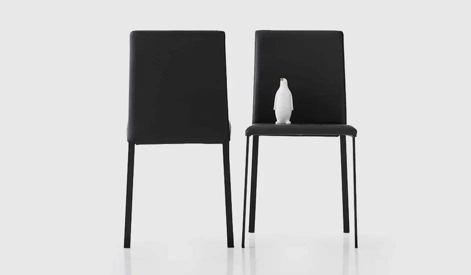 Cinquepuntozero Giulia Italian black leather dining armchair with metal legs at ArkNova Interiors Paphos showroom in Cyprus