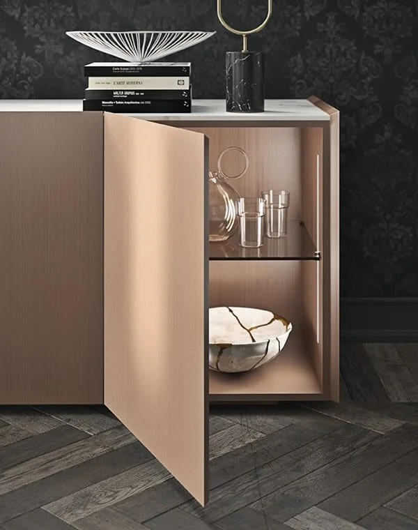 Antares Cucine ZEN Plus Italian design bronze kitchen cabinet open door interior with glass shelves, decanter set and marble bowl – modern kitchen storage detail by ArkNova Interiors in Paphos Cyprus