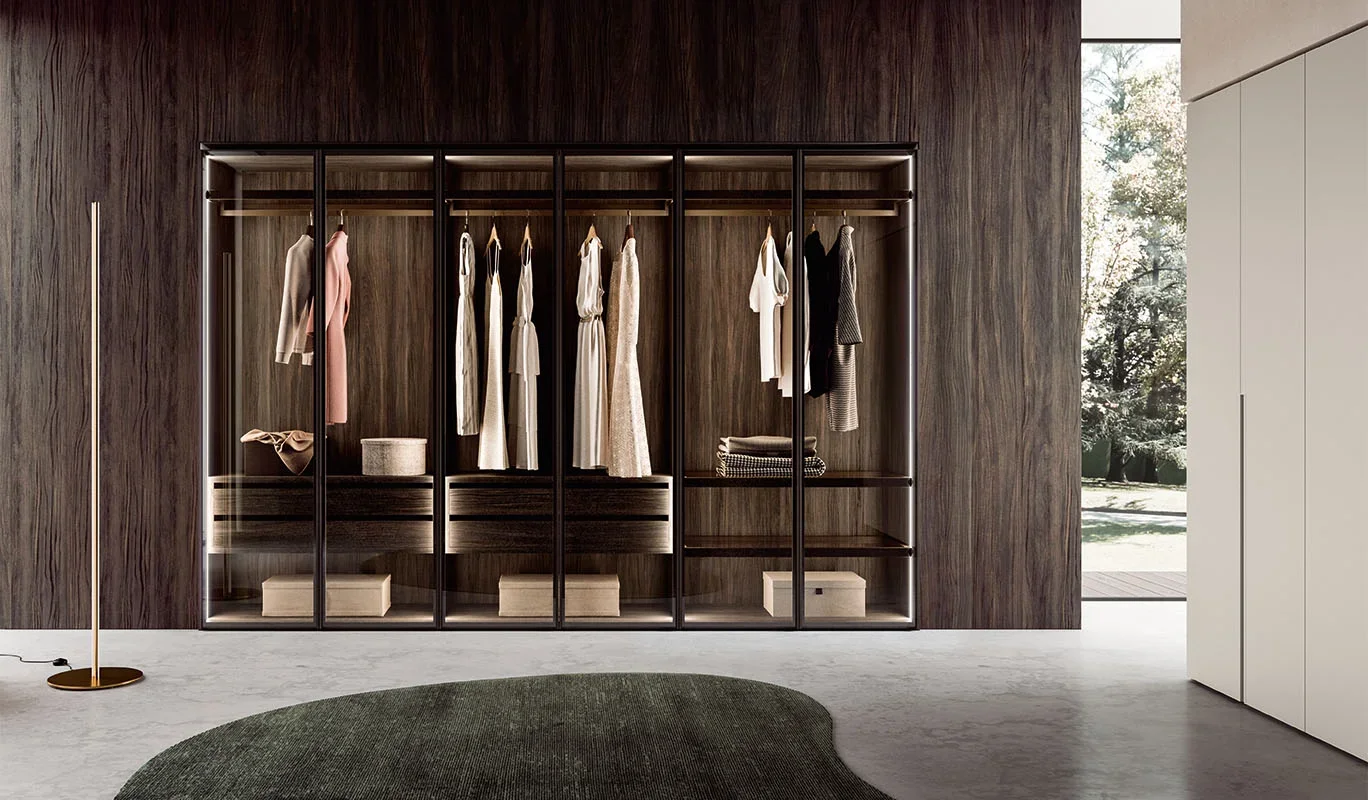 Italian Cinquepuntozero Loom Door dark wood glass hinged display wardrobe with interior lighting at ArkNova Interiors Paphos showroom in Cyprus