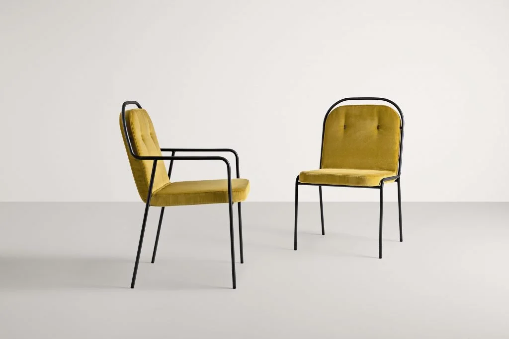 Frag Olimpia Italian yellow velvet dining chairs with black frame at ArkNova Interiors Paphos showroom in Cyprus