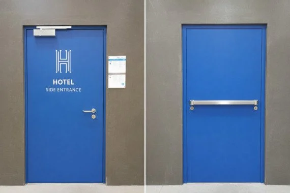 Novoferm Modula Italian blue hotel fire-rated door with side entrance logo and panic bar at ArkNova Interiors Paphos Cyprus
