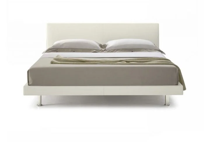 Italian Cleo bed by Albani Divani featuring clean white leather upholstery and minimalist design at ArkNova Interiors Paphos Cyprus