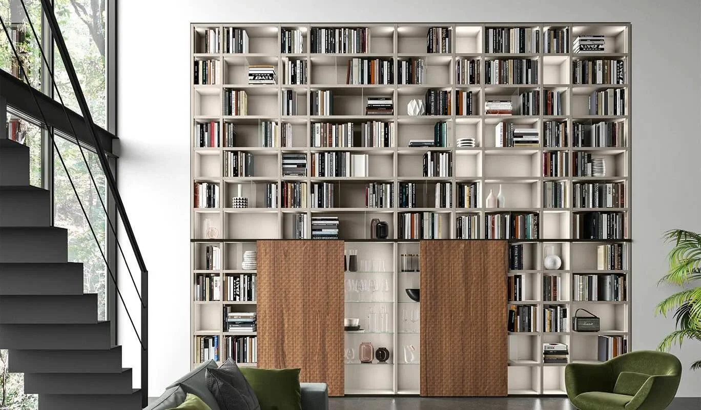 Cinquepuntozero BK01 Italian white modular full-wall bookcase with wood accents at ArkNova Interiors Paphos showroom in Cyprus