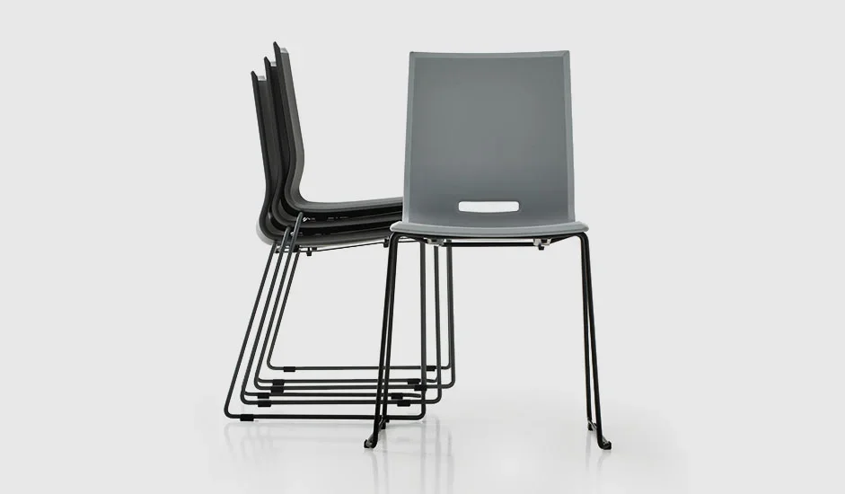 Cinquepuntozero Elena Italian gray stacking armchair with black metal frame at ArkNova Interiors Paphos showroom in Cyprus