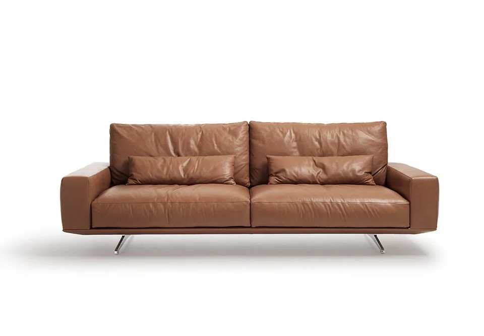 Albani Divani Extrasoft Italian brown leather three-seater sofa, modern design at ArkNova Interiors Paphos showroom in Cyprus