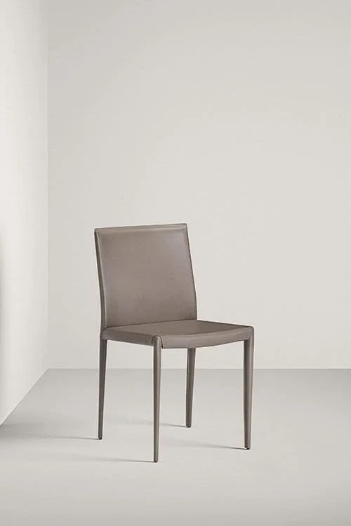 Frag Lilly Italian gray leather dining chair with high back and wooden legs at ArkNova Interiors Paphos showroom in Cyprus