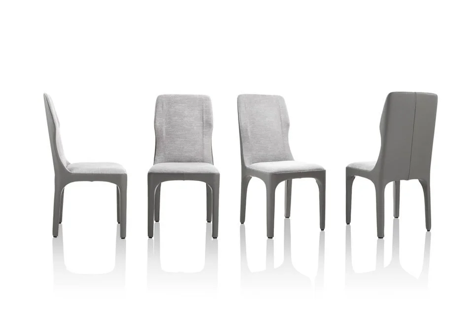 Albani Divani Giulietta Italian gray upholstered dining chair with modern back design at ArkNova Interiors Paphos showroom in Cyprus