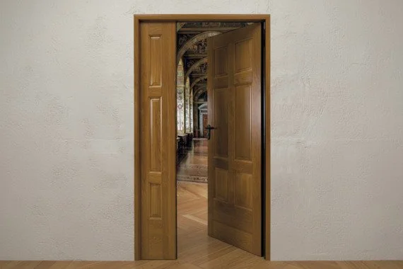Novoferm Shield Italian wooden panel fire-rated door open to classic interior at ArkNova Interiors Paphos Cyprus