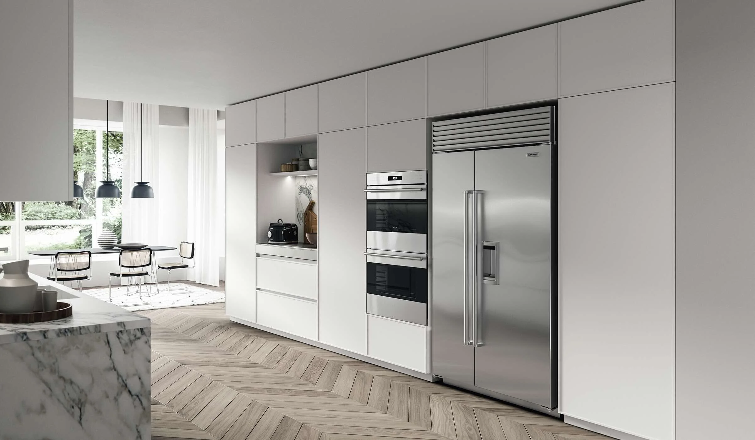 Antares Cucine TK 22 Italian fitted kitchen wall unit with built-in ovens and stainless steel refrigerator, open plan dining area visible, Paphos Cyprus by ArkNova Interiors