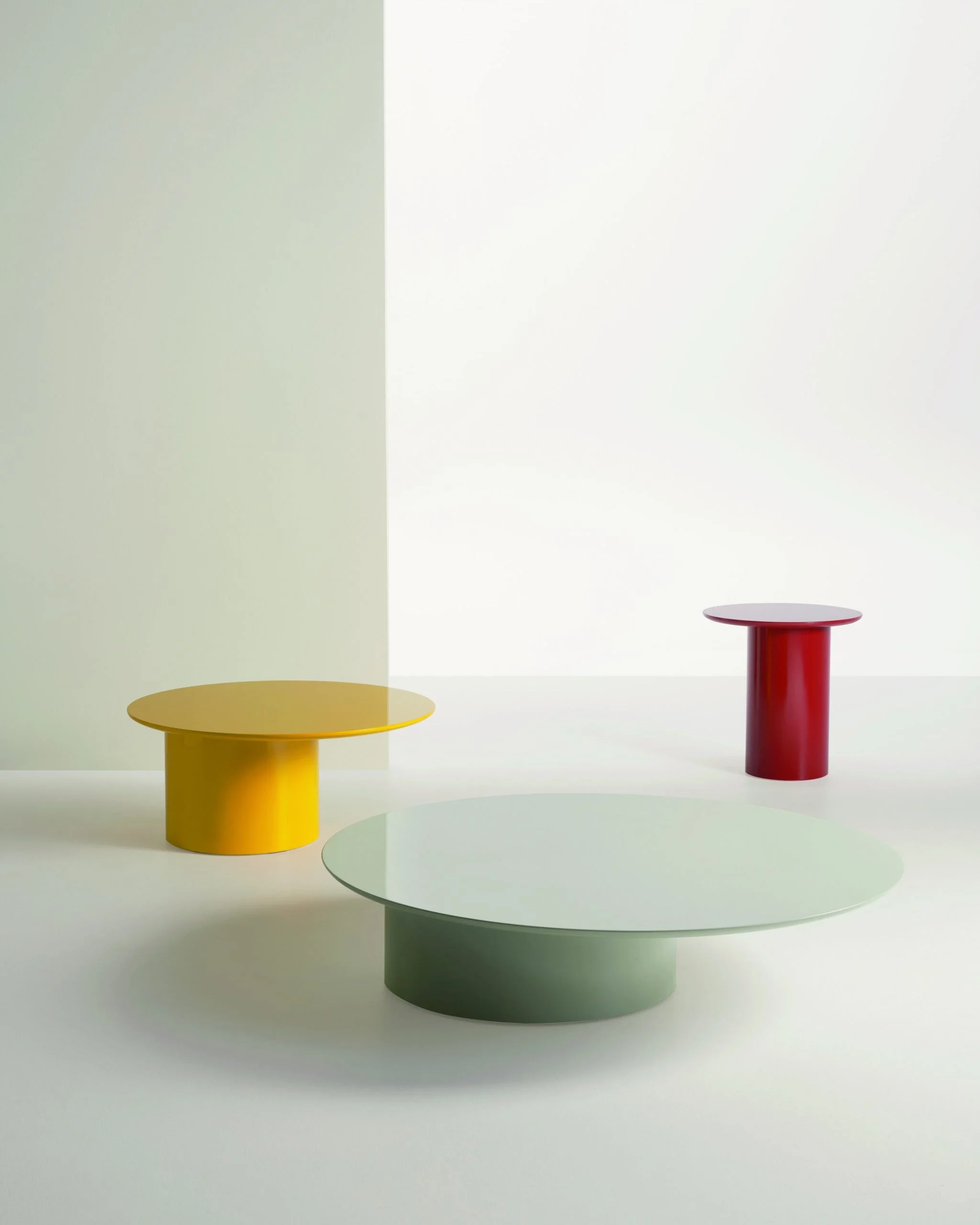 Frag Myon 80 Italian round pedestal side tables in yellow, red and sage green, modern design at ArkNova Interiors Paphos showroom in Cyprus
